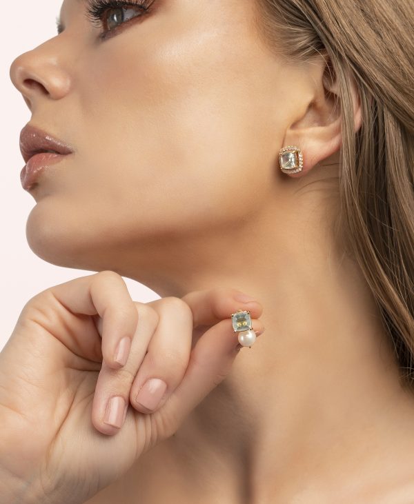 a woman with her finger on her neck